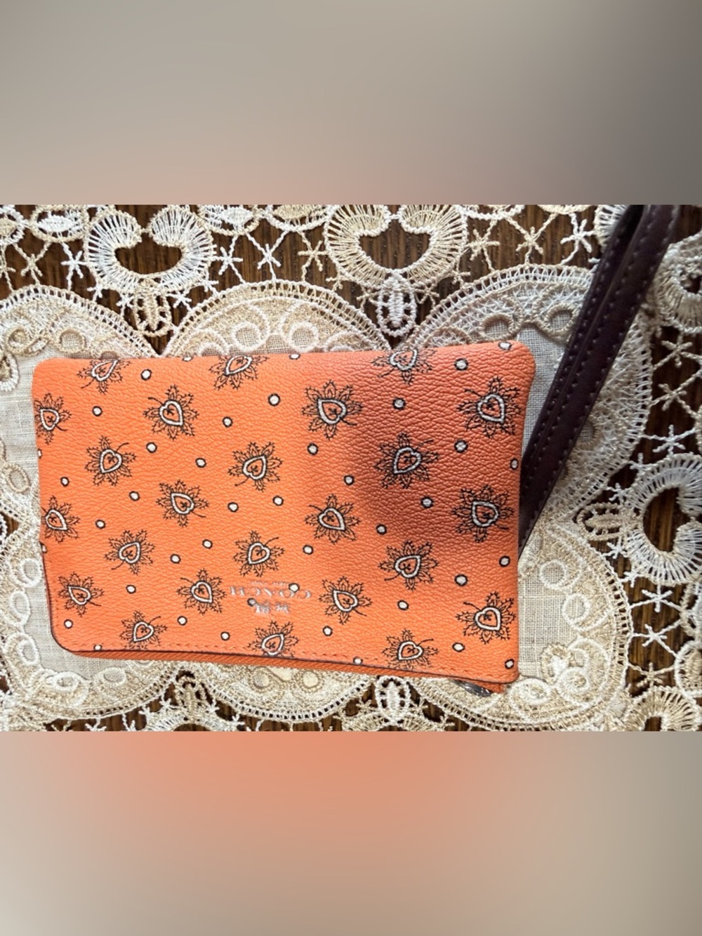 Coach Orange Floral Heart Print Wristlet with Brown Strap